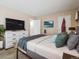 Comfortable bedroom with modern decor and plenty of natural light at 381 S Ames St # G101, Lakewood, CO 80226