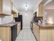 Efficient kitchen featuring modern appliances and ample counter space at 381 S Ames St # G101, Lakewood, CO 80226