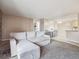 Comfortable living space featuring plush seating and dining area at 381 S Ames St # G101, Lakewood, CO 80226