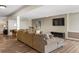 Relax in this furnished basement offering a comfortable seating area and stylish pool table at 5790 Fox Run Ct, Parker, CO 80134