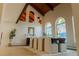 Bright dining room with high ceilings, stained glass windows, and modern furnishings at 326 E Oak Hills Dr, Castle Rock, CO 80108
