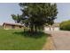 Spacious three car garage with a driveway and a separate building with a single bay garage at 326 E Oak Hills Dr, Castle Rock, CO 80108