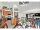 Eat-in kitchen featuring stainless steel appliances and a granite-topped island with seating at 15776 E 107Th Way, Commerce City, CO 80022