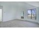 Bedroom featuring a bright space and a lovely view out the window at 2497 S Victor St # F, Aurora, CO 80014