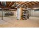 Unfinished basement with exposed ceiling, ductwork and potential for customization at 7915 Flower St # D, Arvada, CO 80005