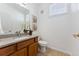 Clean bathroom features granite vanity and updated fixtures at 9980 W Jewell Ave # B, Lakewood, CO 80232