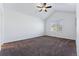 Spacious bedroom with vaulted ceiling and ceiling fan at 9980 W Jewell Ave # B, Lakewood, CO 80232