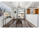 Dining area with glass table and chairs, near kitchen at 9980 W Jewell Ave # B, Lakewood, CO 80232