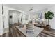 Open living space with fireplace and adjacent entryway at 9980 W Jewell Ave # B, Lakewood, CO 80232