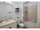 Clean bathroom with a tub, shower, and updated vanity at 15700 E Jamison Dr # 7-205, Englewood, CO 80112