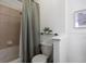 Clean bathroom with shower/tub combo and a neutral color scheme at 15700 E Jamison Dr # 7-205, Englewood, CO 80112