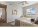 Spacious bedroom with large window and ample natural light at 15700 E Jamison Dr # 7-205, Englewood, CO 80112