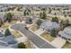 Aerial view of a residential neighborhood showcasing manicured lawns and well-maintained homes at 6041 S Salida Ct, Aurora, CO 80016
