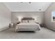 Spacious bedroom featuring a large bed and neutral décor with a nice view at 6041 S Salida Ct, Aurora, CO 80016