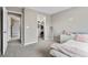 Bedroom with a bed, doorway, and a closet that provides ample storage space at 6041 S Salida Ct, Aurora, CO 80016