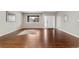 Spacious living room with hardwood floors and a bright, open feel, providing ample natural light at 6041 S Salida Ct, Aurora, CO 80016