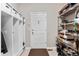 Mud room with built-in storage lockers and shelving for shoes at 6041 S Salida Ct, Aurora, CO 80016