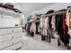 Walk-in closet with shelves and rods providing ample storage space at 6041 S Salida Ct, Aurora, CO 80016