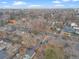 Panoramic aerial view of a neighborhood with tree-lined streets and single-Gathering homes at 1545 Locust St, Denver, CO 80220