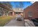 This backyard is perfect for entertaining with a patio, bar, and plenty of space for relaxing and grilling at 1545 Locust St, Denver, CO 80220