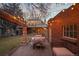 Large backyard features brick outdoor kitchen, grill area, with the perfect ambiance for relaxing, dining and entertaining at 1545 Locust St, Denver, CO 80220
