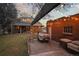 Large backyard features brick outdoor kitchen, grill area, with the perfect ambiance for relaxing, dining and entertaining at 1545 Locust St, Denver, CO 80220