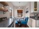 Inviting breakfast nook with built-in seating, stylish chairs, and natural light, ideal for enjoying morning coffee at 1545 Locust St, Denver, CO 80220
