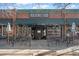 Exterior view of a charming restaurant with outdoor seating and a brick facade at 1545 Locust St, Denver, CO 80220