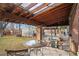 Covered patio with wood ceiling and brick columns; perfect for outdoor entertaining and relaxing at 1545 Locust St, Denver, CO 80220