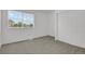 Comfortable bedroom with a large window for natural light and a spacious closet at 4883 W 68Th Ave # 3, Westminster, CO 80030