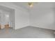 Spacious bedroom with overhead fan and lighting, plush carpet and ample space for furniture at 4883 W 68Th Ave # 3, Westminster, CO 80030