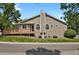 Exterior view of the side of the home showcasing the deck, siding, and landscaping at 4883 W 68Th Ave # 3, Westminster, CO 80030