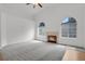 Spacious living room featuring neutral walls, carpet and a cozy fireplace at 4883 W 68Th Ave # 3, Westminster, CO 80030