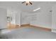 Spacious living room featuring hardwood floors, neutral walls and ceiling fan at 4883 W 68Th Ave # 3, Westminster, CO 80030