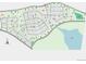 Community aerial view featuring planned streets, residential lots, green spaces, and a lake amenity at 16618 W 92Nd Pl, Arvada, CO 80007