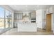 Beautiful kitchen featuring an island, stainless steel appliances, and gray cabinets at 16618 W 92Nd Pl, Arvada, CO 80007