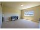 Well-lit bedroom with cozy carpet, a built-in closet and a back view at 27565 E Nova Pl, Aurora, CO 80016