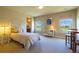 Bright bedroom with cozy carpeting, natural light and backyard views, ideal for relaxation at 27565 E Nova Pl, Aurora, CO 80016