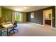 Bedroom with a desk area, carpet floors and neutral walls offering a soothing atmosphere at 27565 E Nova Pl, Aurora, CO 80016