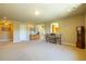 Expansive bonus room with natural light, neutral carpet, and flexible layout offers versatility at 27565 E Nova Pl, Aurora, CO 80016