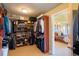 Spacious walk-in closet with custom shelving and ample storage, ideal for organization at 27565 E Nova Pl, Aurora, CO 80016