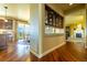 Bright kitchen with dining area, backyard views, and modern design features at 27565 E Nova Pl, Aurora, CO 80016