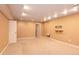 Basement featuring neutral walls and carpeting, recessed lighting, and a TV mount at 9025 W 79Th Way # D, Arvada, CO 80005