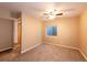 Cozy basement bedroom with a ceiling fan and closet at 9025 W 79Th Way # D, Arvada, CO 80005