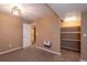 Basement bedroom with a walk-in closet, neutral walls and carpeting at 9025 W 79Th Way # D, Arvada, CO 80005