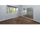 Bedroom featuring a carpeted floor and a large window for natural light at 9025 W 79Th Way # D, Arvada, CO 80005