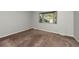 Bedroom featuring a bay window offering exterior views and carpeted floors at 9025 W 79Th Way # D, Arvada, CO 80005
