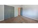 Carpeted bedroom featuring closet space at 9025 W 79Th Way # D, Arvada, CO 80005