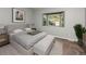 Calming bedroom with a bay window, neutral colors, and cozy furniture at 9025 W 79Th Way # D, Arvada, CO 80005