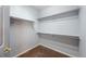 Walk-in closet with built-in shelving and carpeted floor at 9025 W 79Th Way # D, Arvada, CO 80005